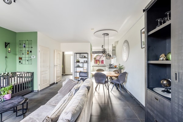 Foto - Te koop:  Verzorgde tussenwoning in Fijnaart!